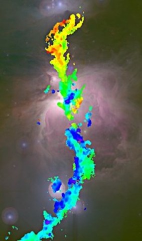The motions of interstellar gas (foreground) seen in contrast to the optical view of the Orion molecular cloud (background).” Credit: Stephen Gwyn, Canadian Astronomy Data Centre/National Research Council of Canada (CNW Group/National Research Council Canada)